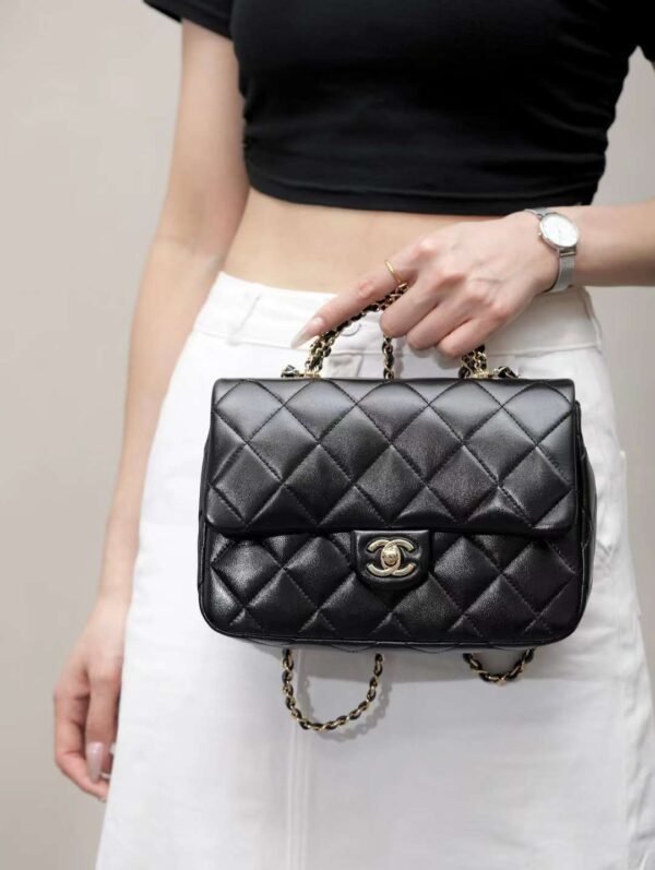 CHANEL mouth cover with handle