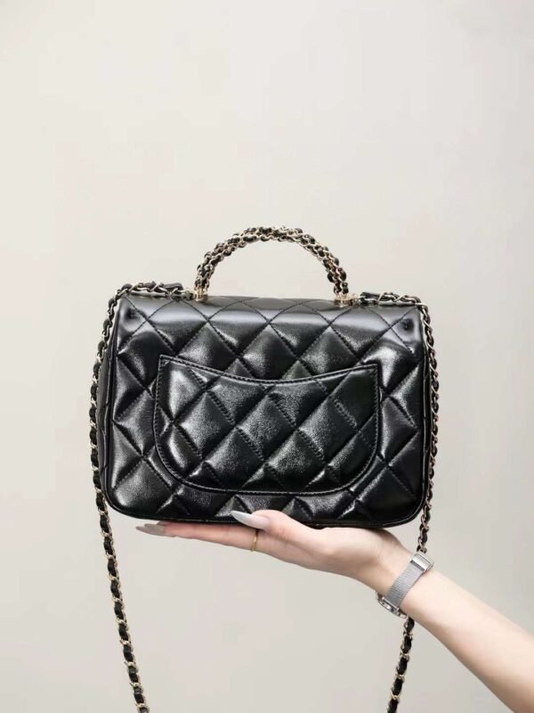 CHANEL mouth cover with handle