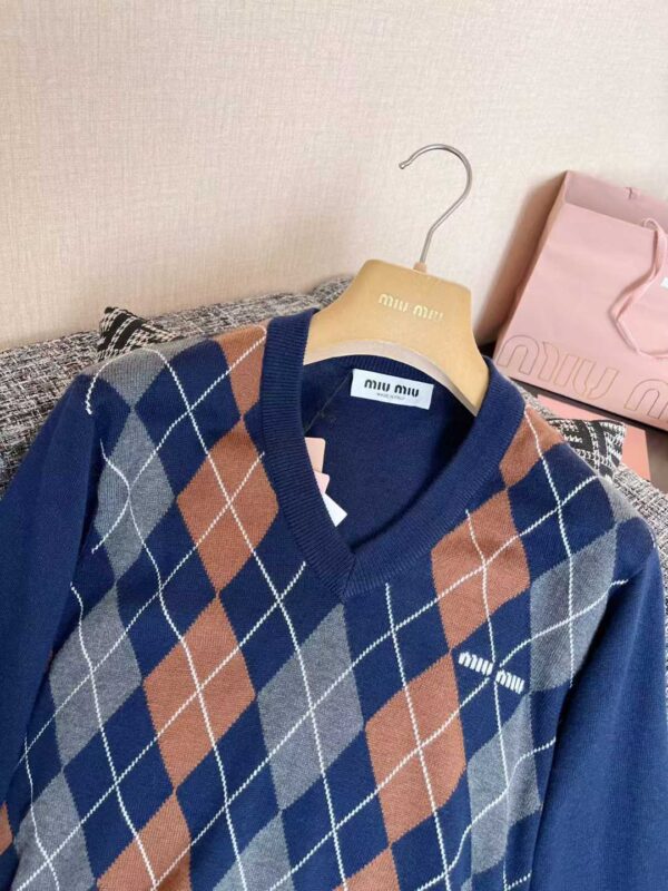 MIUMIU Knitted sweaters