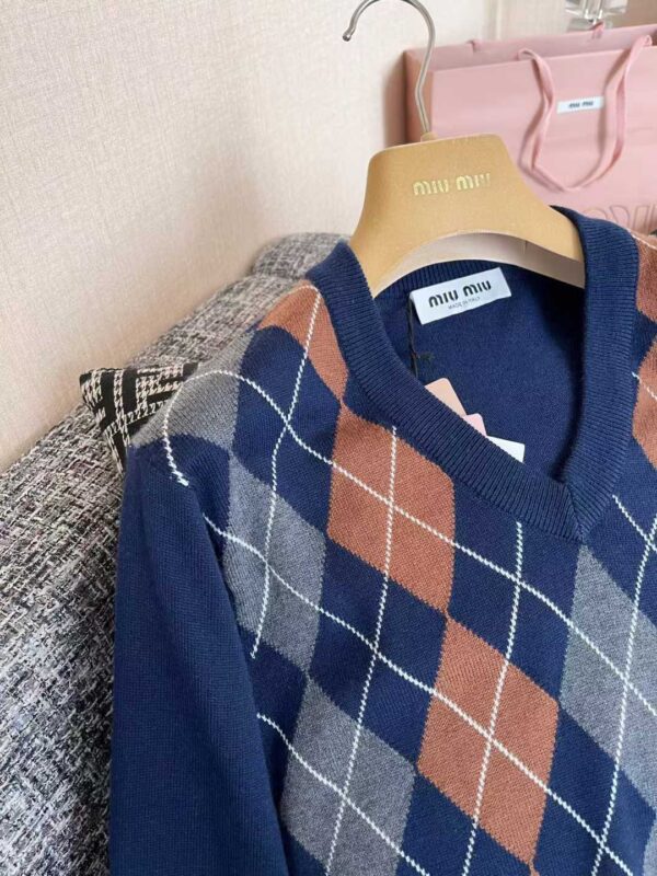 MIUMIU Knitted sweaters