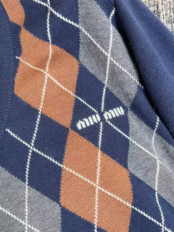 MIUMIU Knitted sweaters