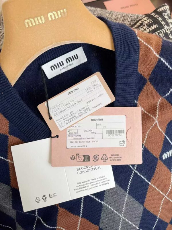 MIUMIU Knitted sweaters