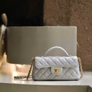 CHANEL Flap Bag with Top Handle