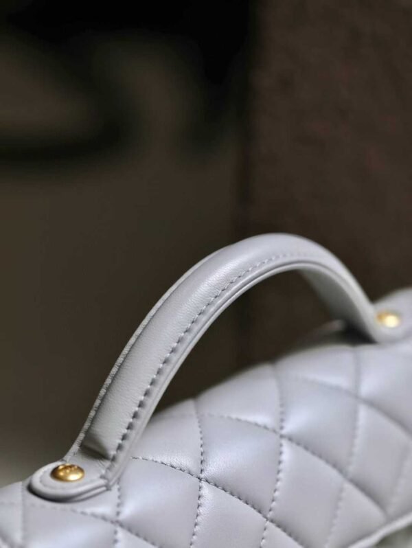 CHANEL Flap Bag with Top Handle