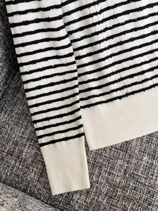 CHANEL Knitted sweaters