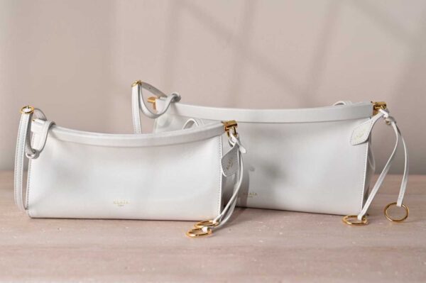 ALAIA LE CLICK EAST WEST SMALL BAG IN NUBUCK