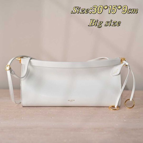 ALAIA LE CLICK EAST WEST SMALL BAG IN NUBUCK