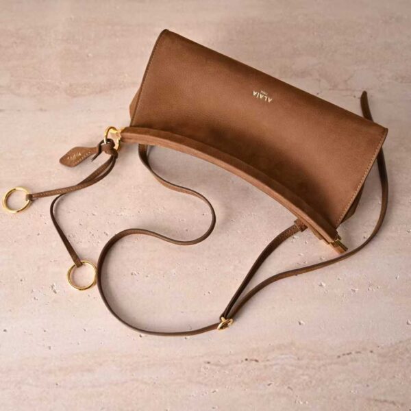 ALAIA LE CLICK EAST WEST SMALL BAG IN NUBUCK