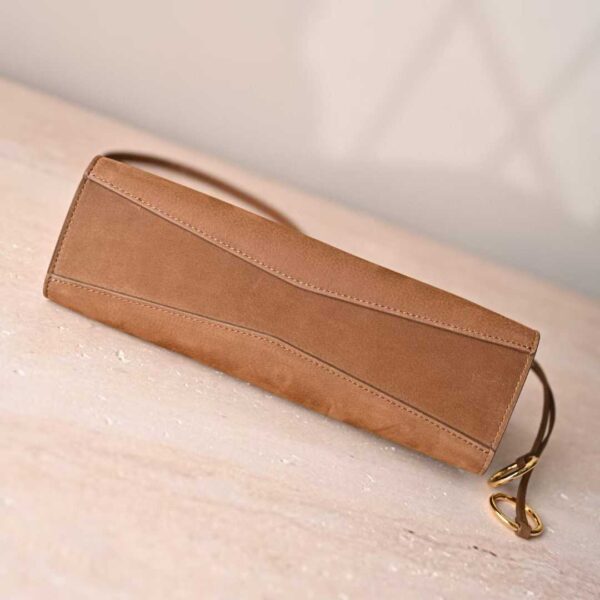 ALAIA LE CLICK EAST WEST SMALL BAG IN NUBUCK