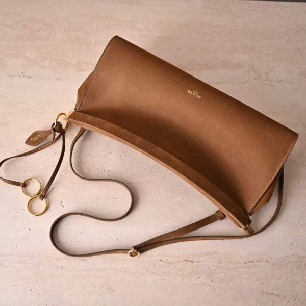 ALAIA LE CLICK EAST WEST SMALL BAG IN NUBUCK