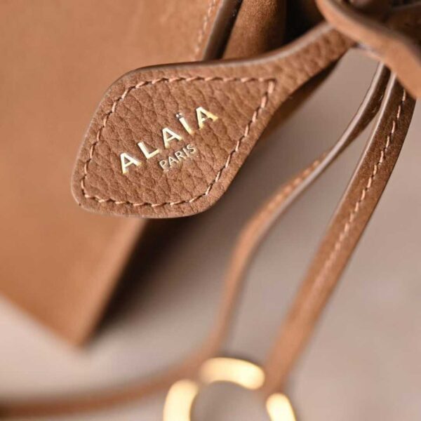 ALAIA LE CLICK EAST WEST SMALL BAG IN NUBUCK