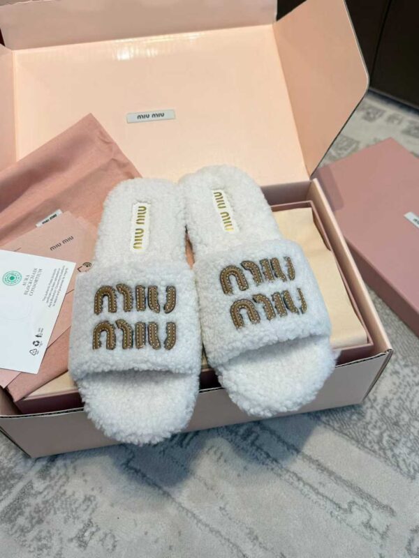 MIUMIU Lamb hair slippers
