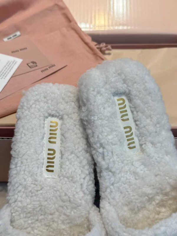 MIUMIU Lamb hair slippers