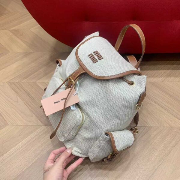MIUMIU Canvas and leather backpack