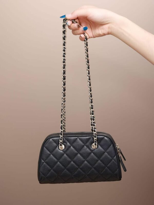 CHANEL Clutch with chain