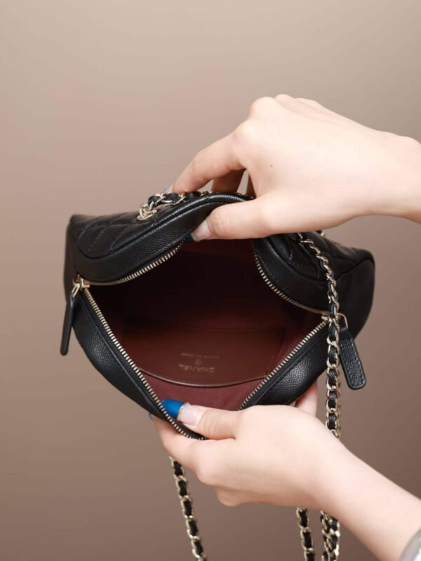 CHANEL Clutch with chain