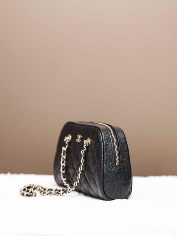 CHANEL Clutch with chain
