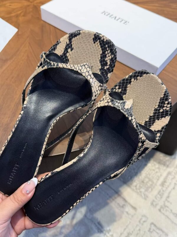 KHAITE Serpentine cat heel sandals