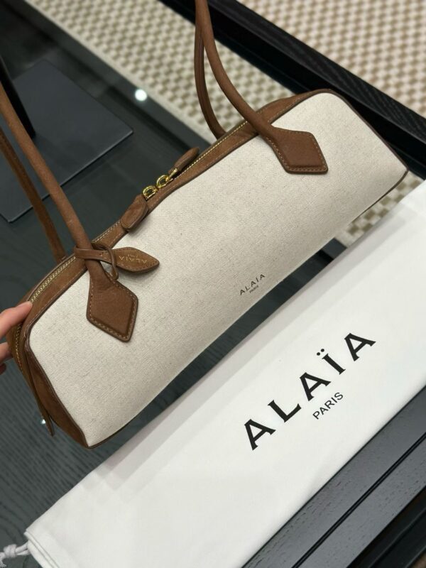 ALAIA LE TECKEL MEDIUM BAG IN CANVAS