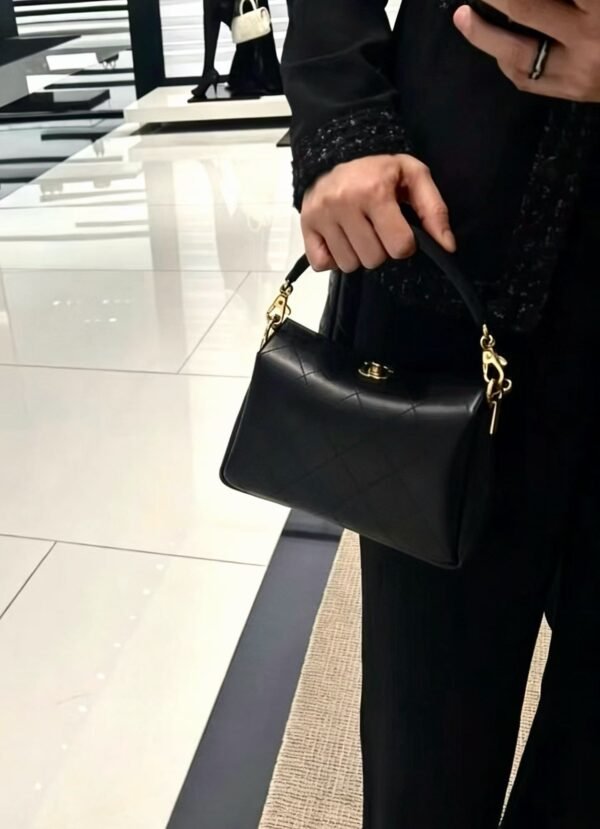 CHANEL Clutch with chain