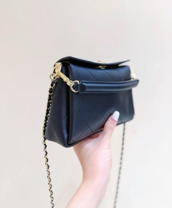 CHANEL Clutch with chain