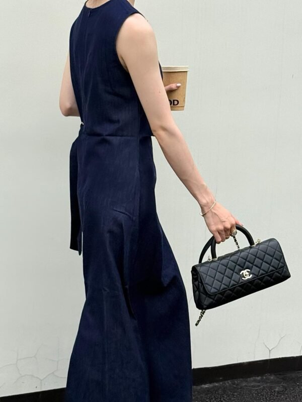 CHANEL Maxi Flap Bag with Top Handle