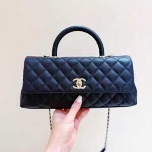 CHANEL Maxi Flap Bag with Top Handle
