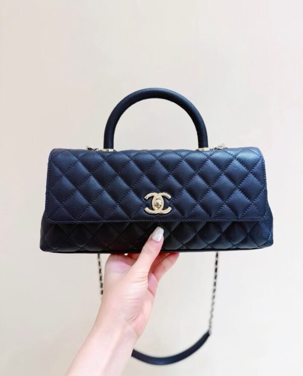 CHANEL Maxi Flap Bag with Top Handle