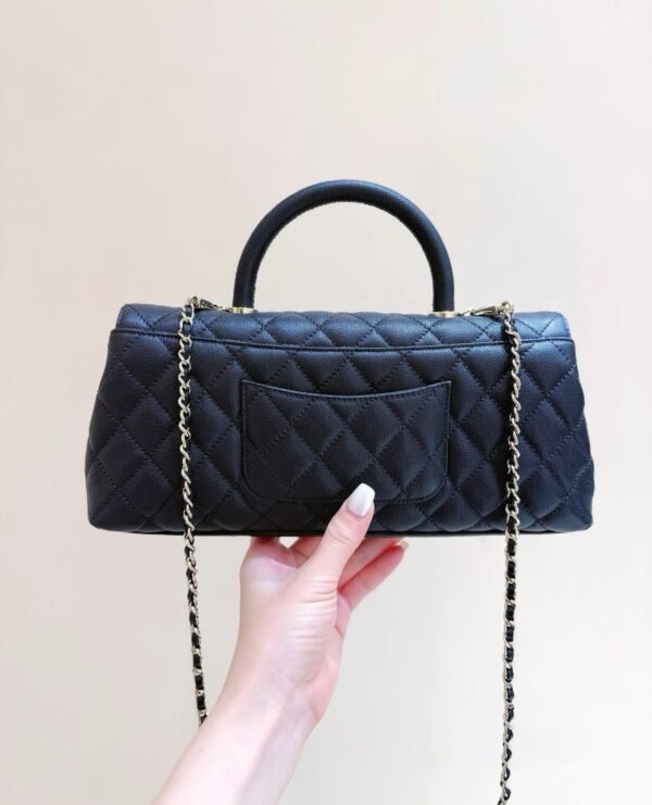 CHANEL Maxi Flap Bag with Top Handle