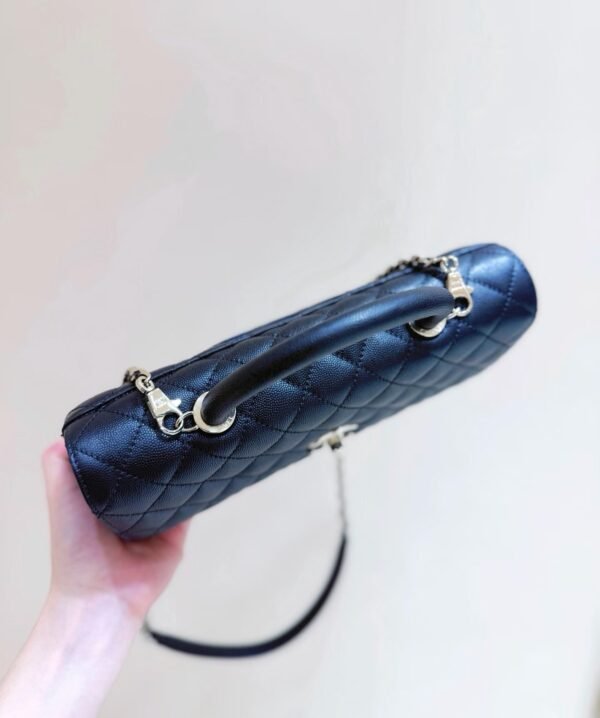 CHANEL Maxi Flap Bag with Top Handle