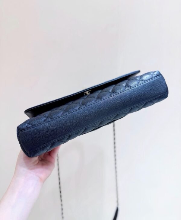 CHANEL Maxi Flap Bag with Top Handle
