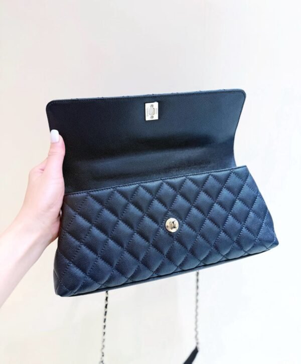 CHANEL Maxi Flap Bag with Top Handle