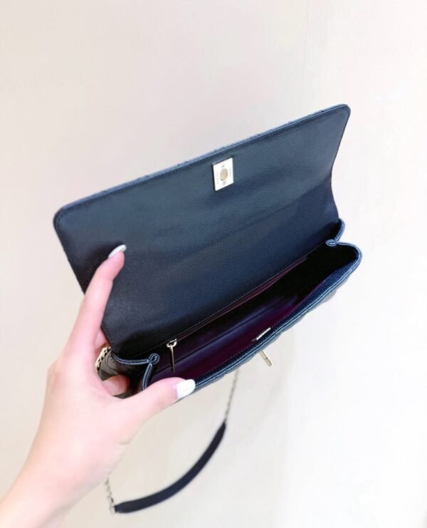 CHANEL Maxi Flap Bag with Top Handle
