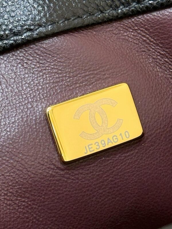 CHANEL Maxi Flap Bag with Top Handle