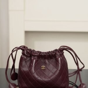 CHANEL Clutch with Leather Strap