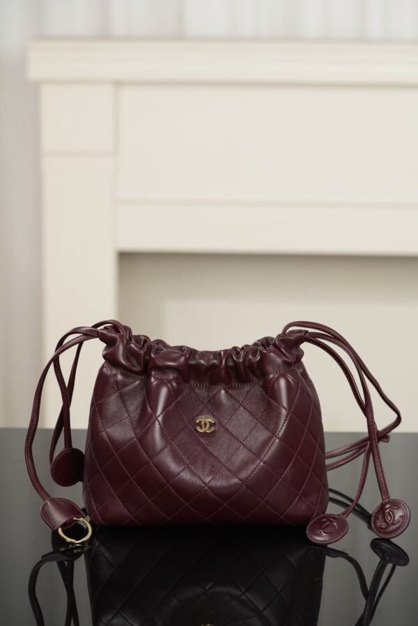 CHANEL Clutch with Leather Strap