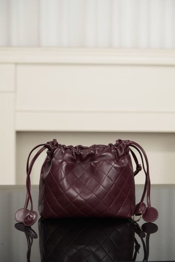CHANEL Clutch with Leather Strap