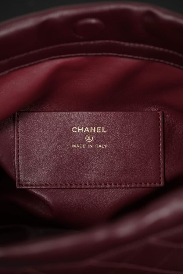 CHANEL Clutch with Leather Strap