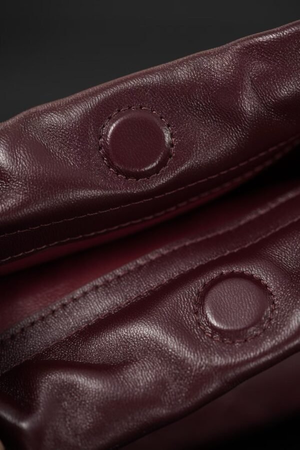 CHANEL Clutch with Leather Strap