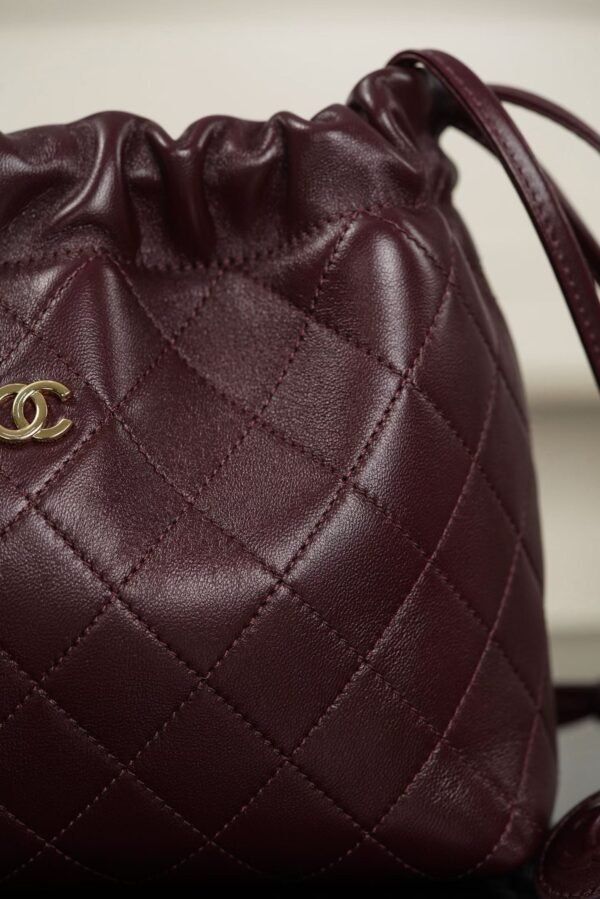 CHANEL Clutch with Leather Strap