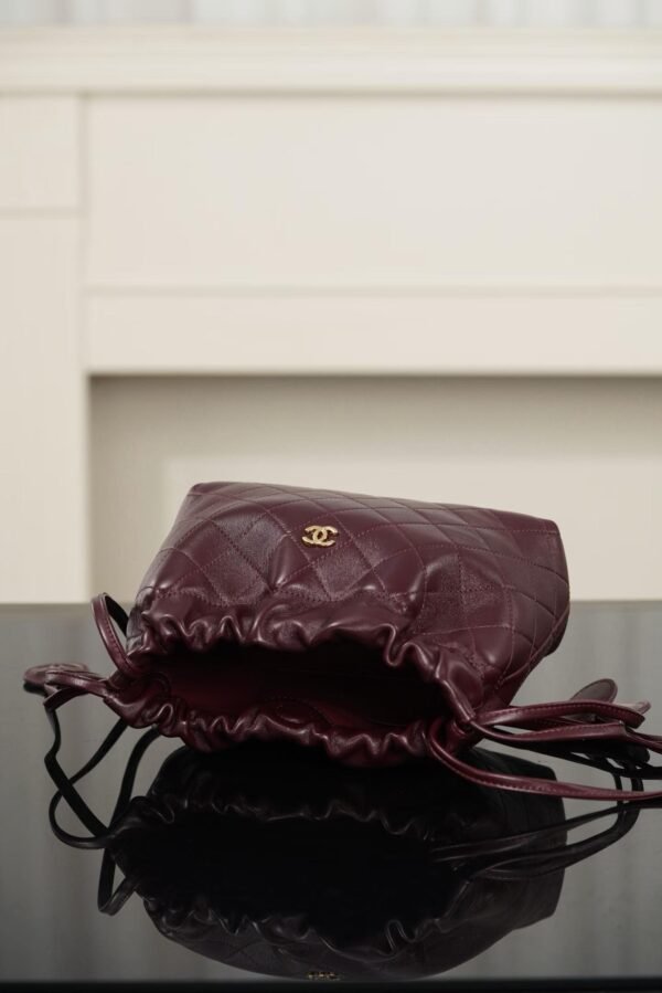 CHANEL Clutch with Leather Strap