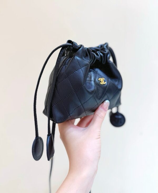 CHANEL Clutch with Leather Strap