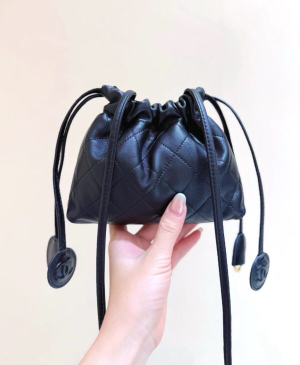CHANEL Clutch with Leather Strap