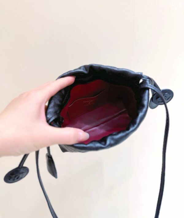 CHANEL Clutch with Leather Strap