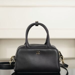 CHANEL Clutch with Leather Strap