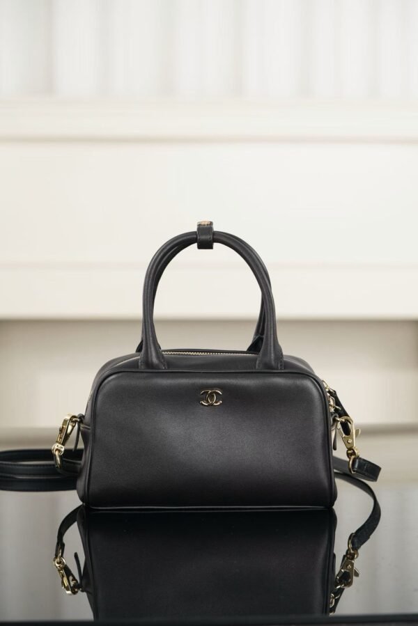 CHANEL Clutch with Leather Strap