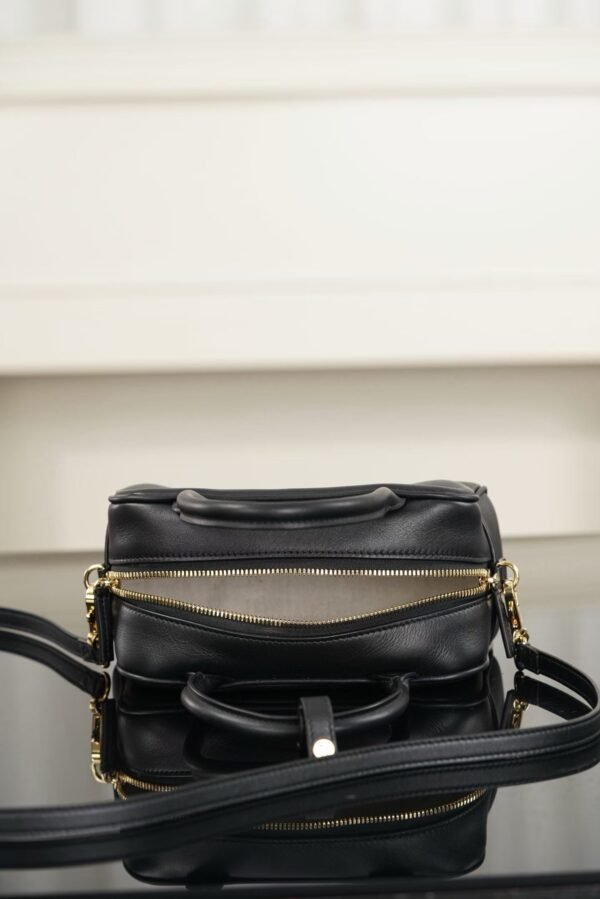 CHANEL Clutch with Leather Strap