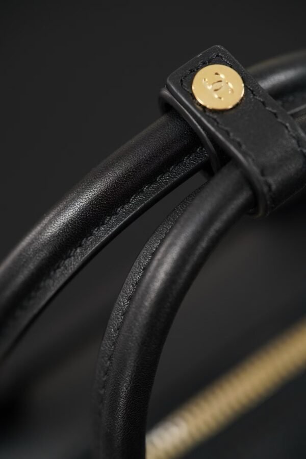 CHANEL Clutch with Leather Strap