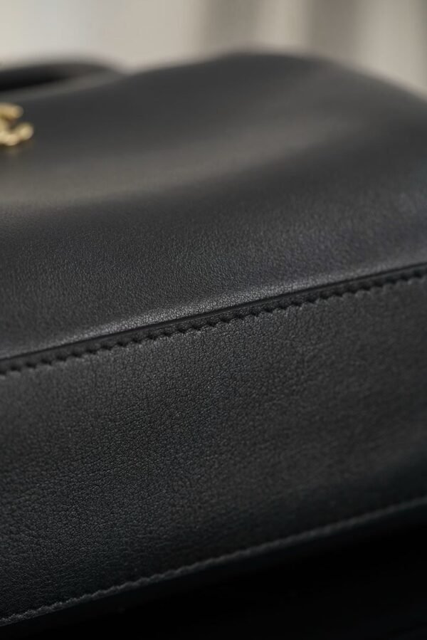 CHANEL Clutch with Leather Strap