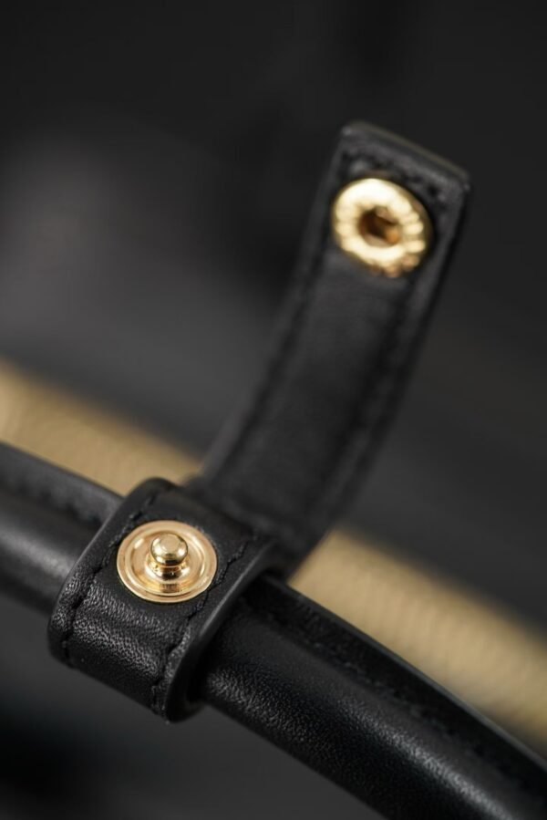 CHANEL Clutch with Leather Strap